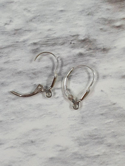 2 זוגות עגילי D מעוטרים בדוגמת צדף Silver 925 - דוארט | DoArt